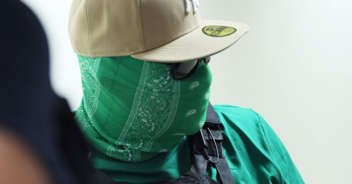 sec-ice-masked-impersonators-2230132283.jpg